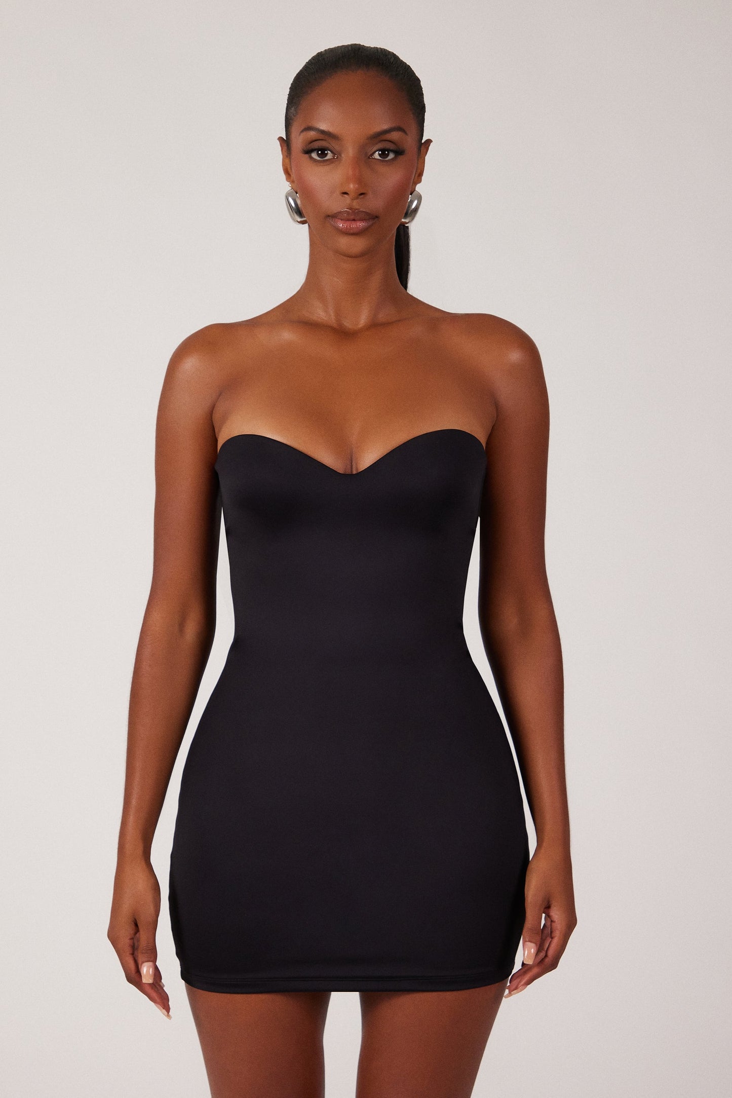 The Sculpt Mini Dress in Black