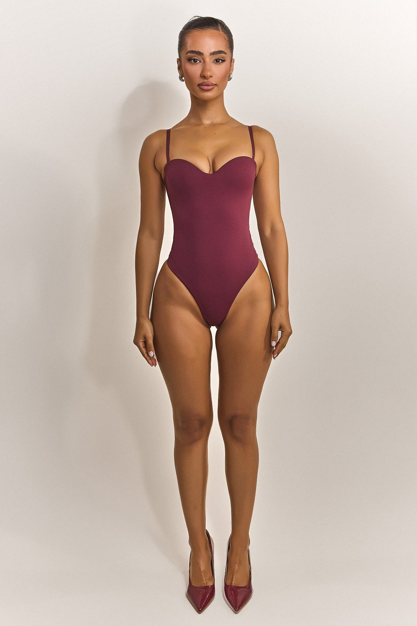 The Sculpt Bodysuit in Red
