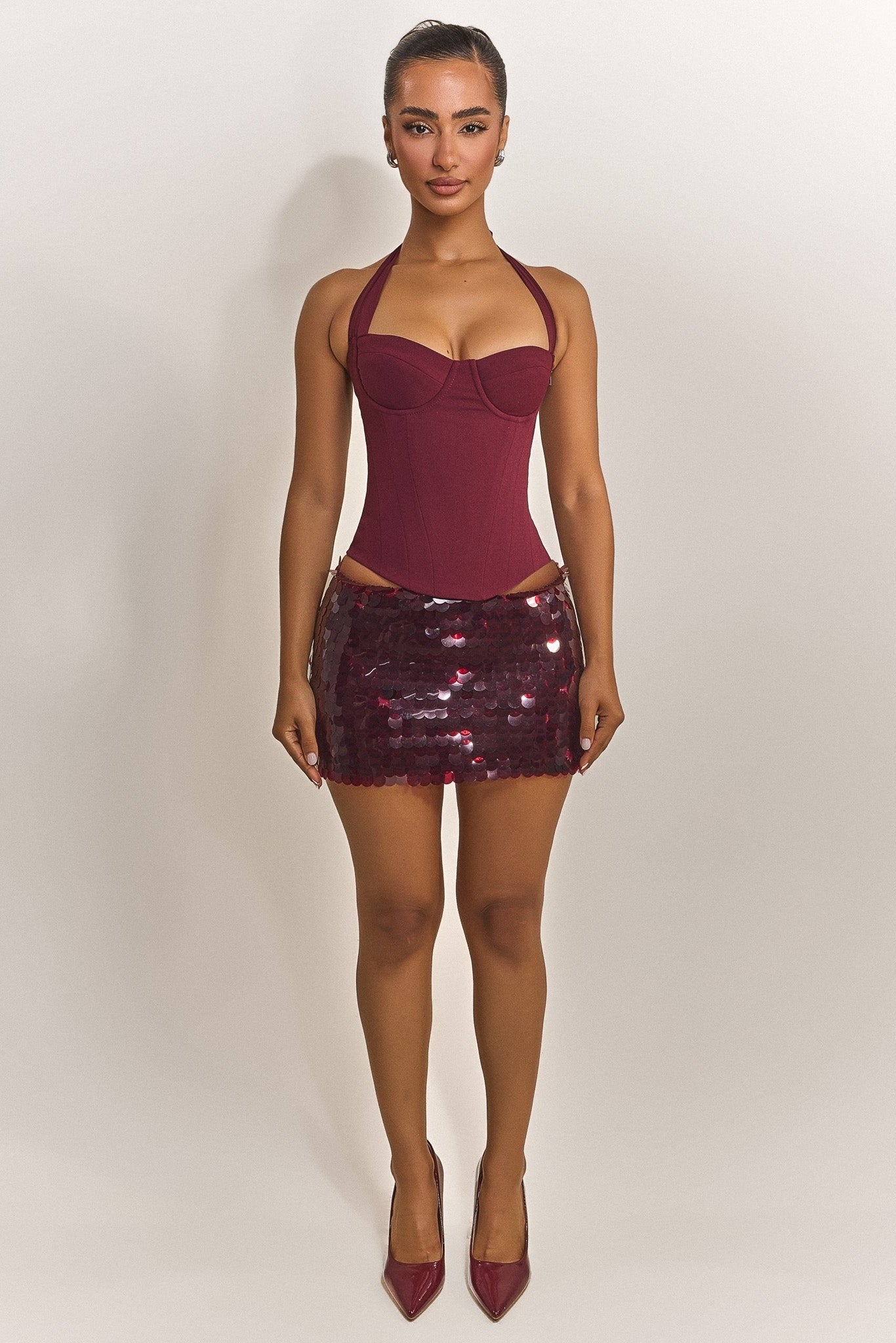 The Shimmi Mini Skirt in Red