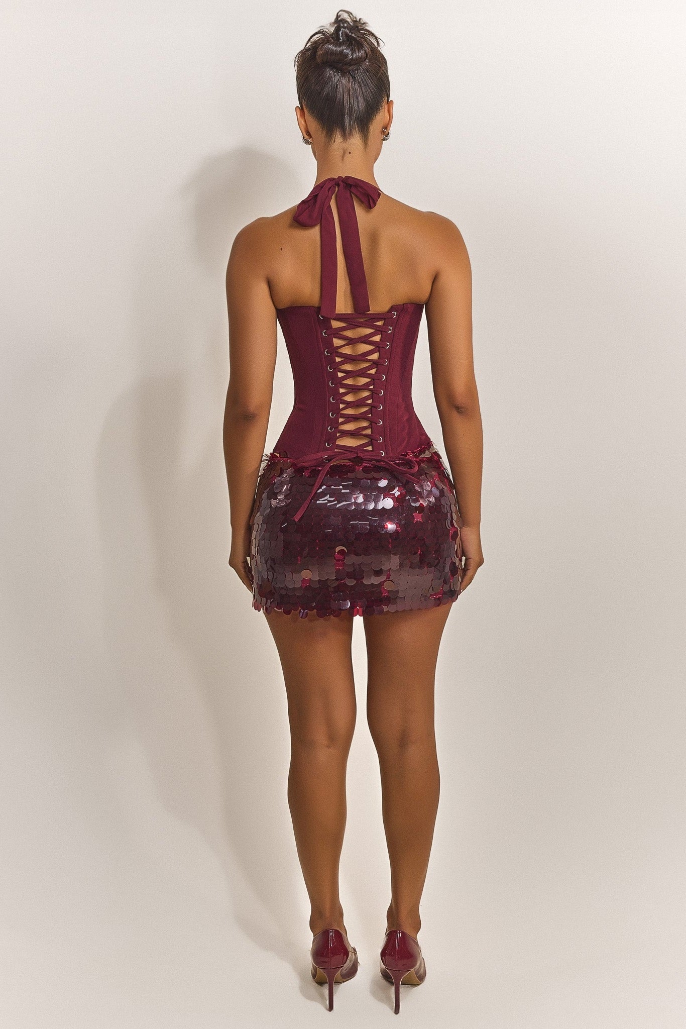 The Shimmi Mini Skirt in Red