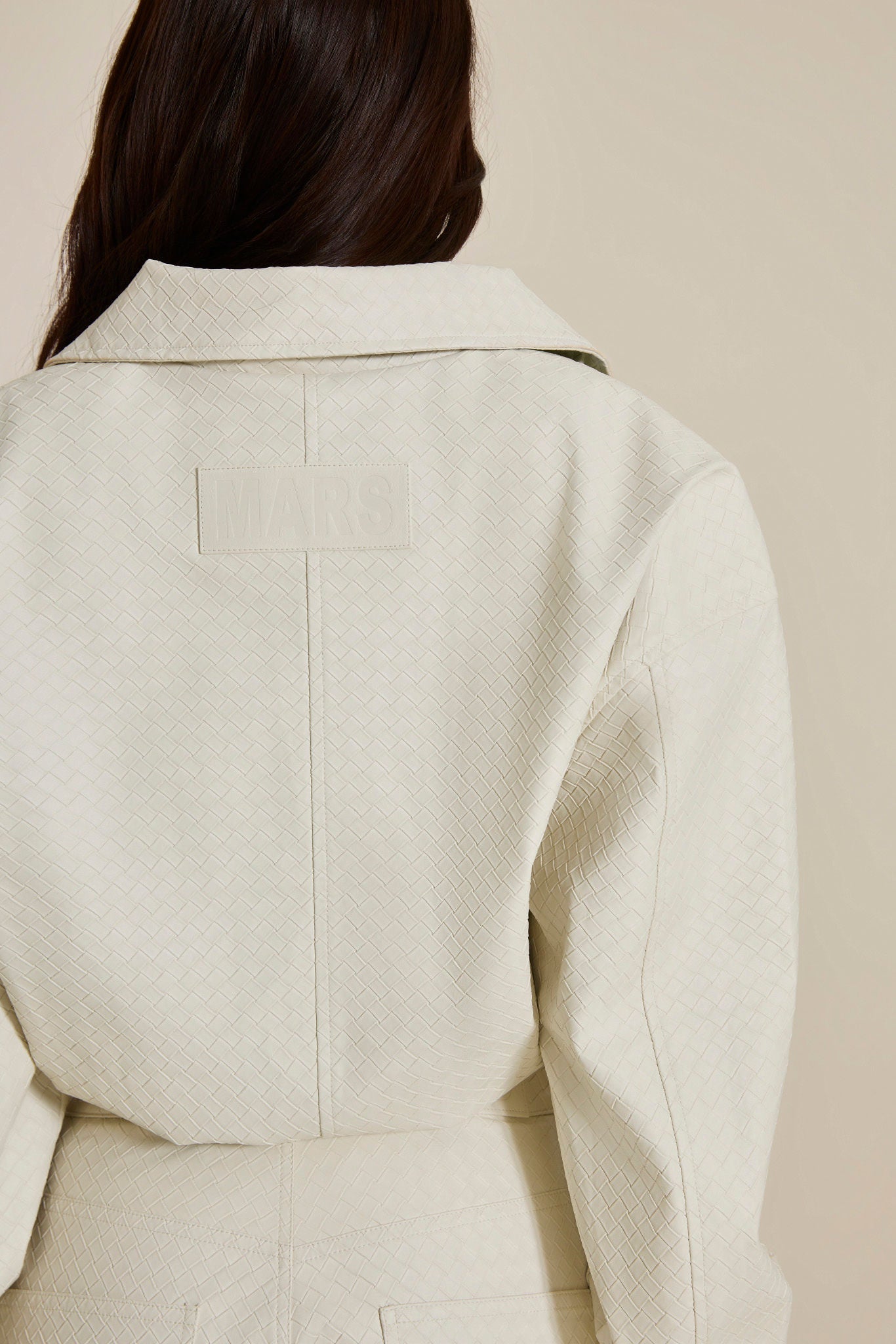 The Nyra Faux Leather Jacket in Off White