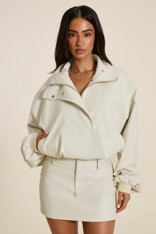 The Nyra Faux Leather Jacket in Off White