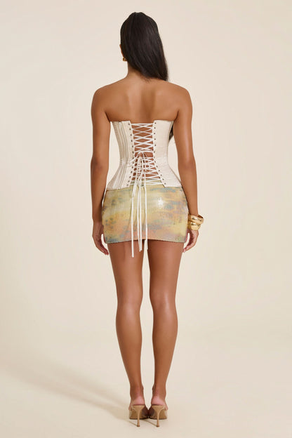 The Nicci Sequin Mini Skirt in Orange Print