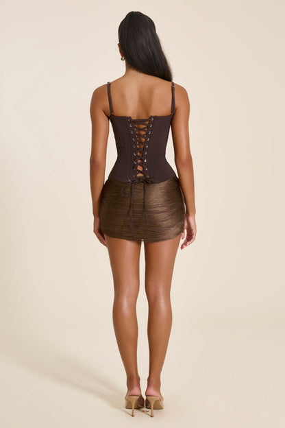 The Jordyn Tassel Mini Skirt in Brown