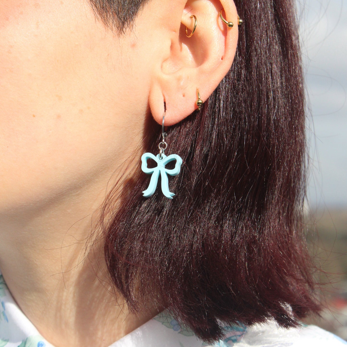 Mini Blue Bow Huggie Hoop Earrings